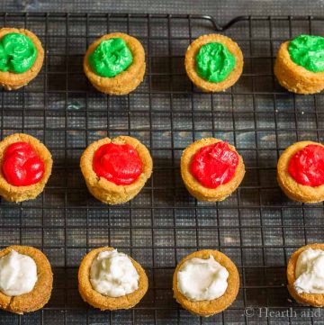 One dozen sugar cookie cups on cooling rack.