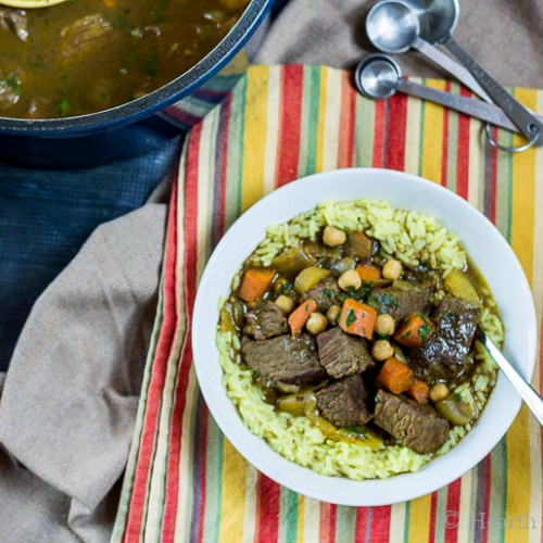 Aerial view of a bowl of Moroccan beef stew.