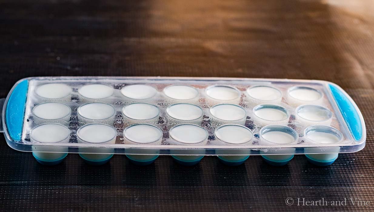 Rubber ice cube tray filled with shower steamer mix