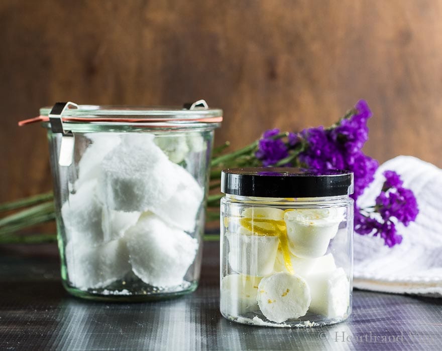 Two jars of shower steams in eucalyptus and bergamot scent.