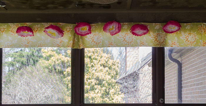 Paper peony garland on porch