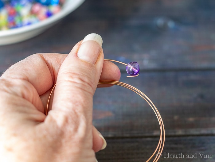 Stringing beads onto wire