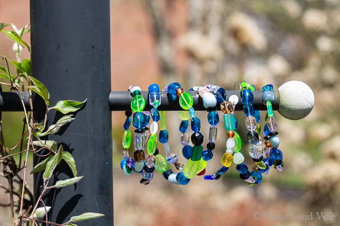 beaded garden ornament on lamp post