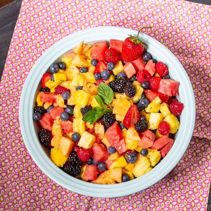 Fruit salad with ginger lime mint dressing