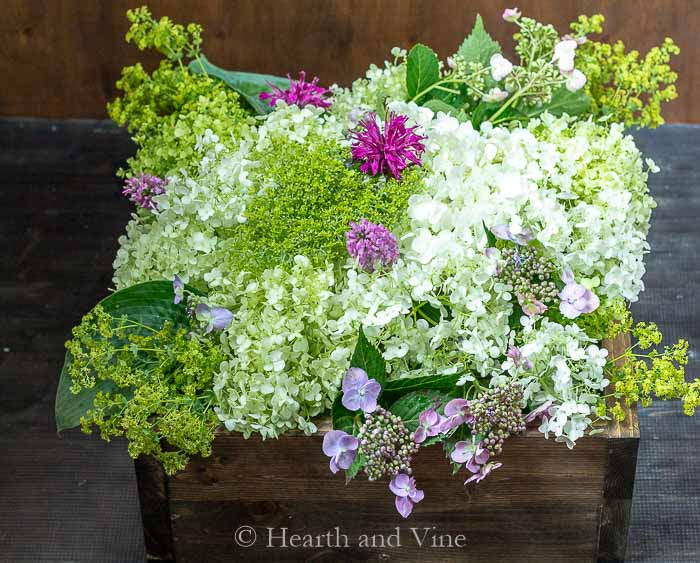 Floral centerpiece in wooden box.