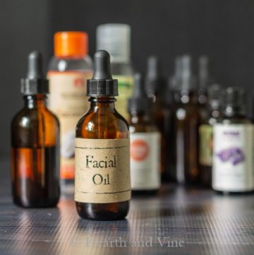 Bottle of facial oil and ingredients