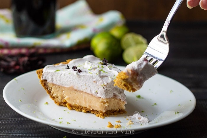 Slice of key lime hibiscus tart.