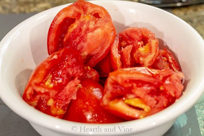 Tomatoes with juice squeezed out in bowl.