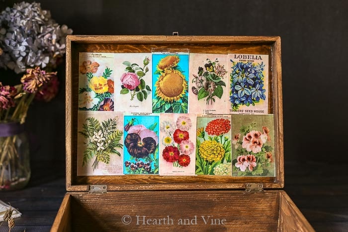 Antique flower seed box inside lid decoupaged 