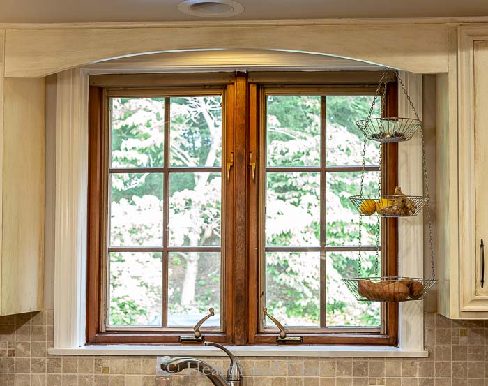 Kitchen window with dark wood dividers