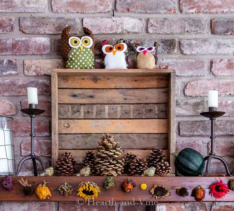 Fall mantel with fabric owls.