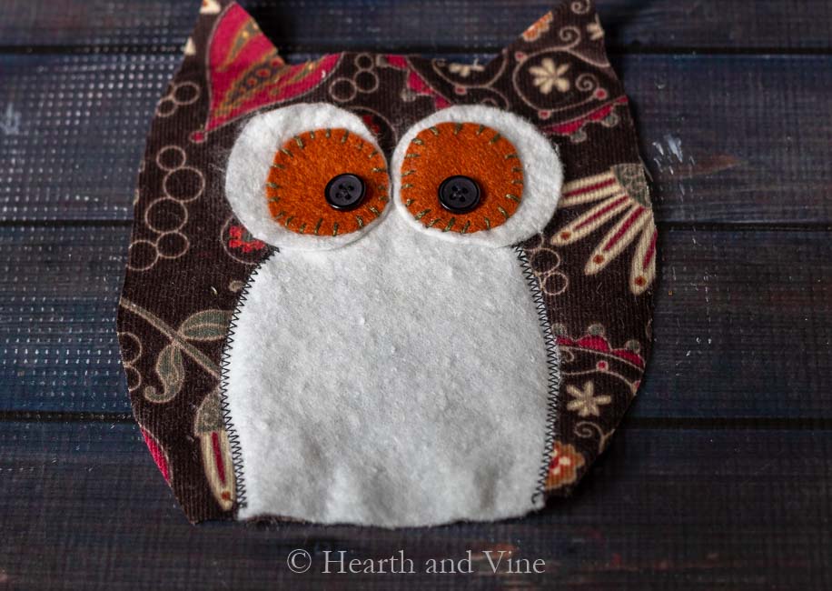 Embroidered eyes on owl