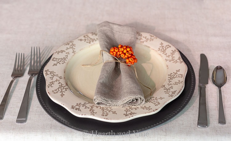 Table setting using faux galvanized charger plate
