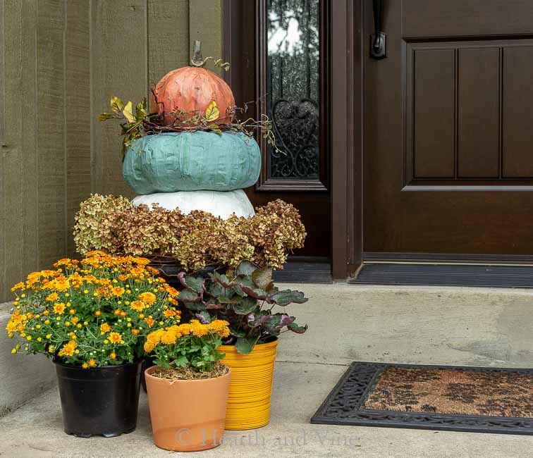 Pumpkin topiary on left side of porch