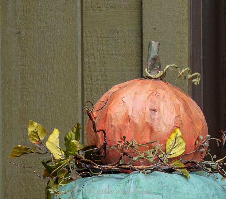 Top pumpkin on topiary with stem
