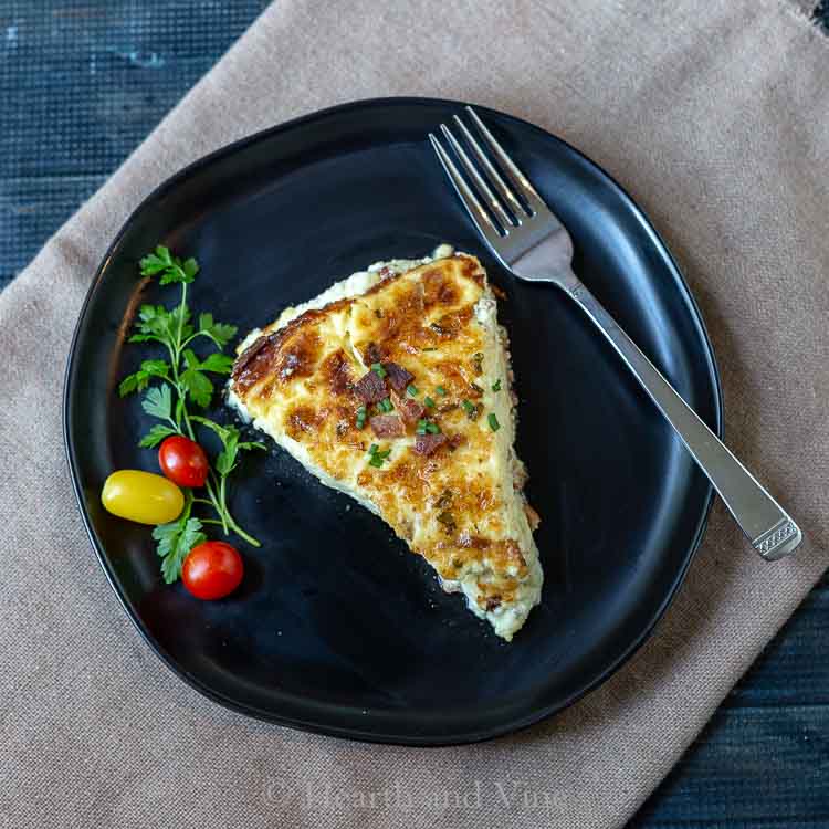 Slice of crustless quiche Lorraine