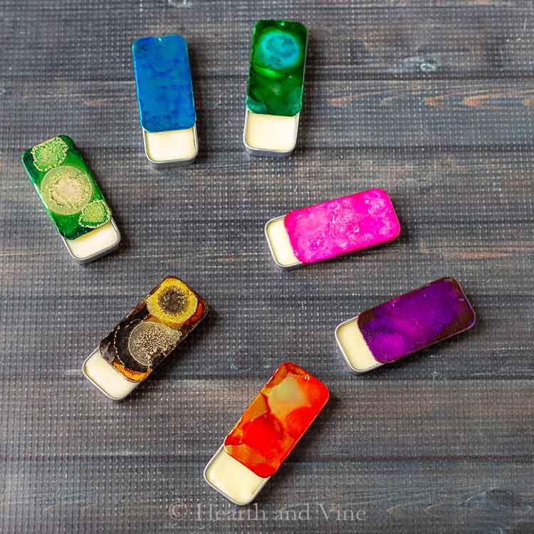 Decorated tins with solid perfume inside