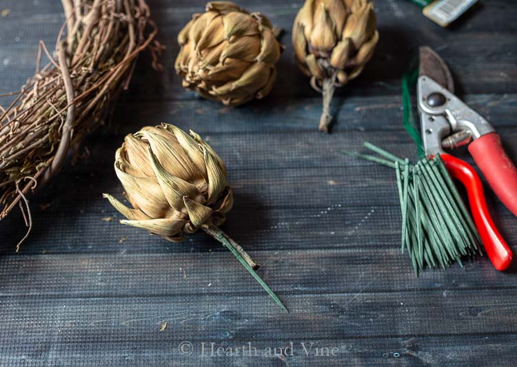 Dried artichokes with floral picks