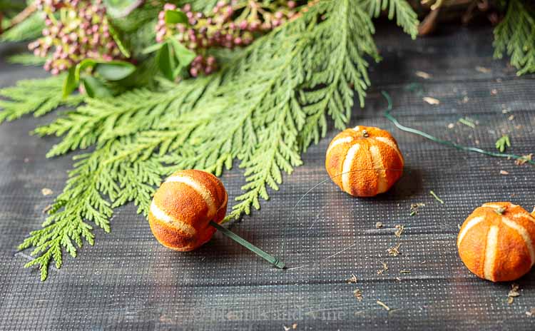 Dried clementines with floral picks