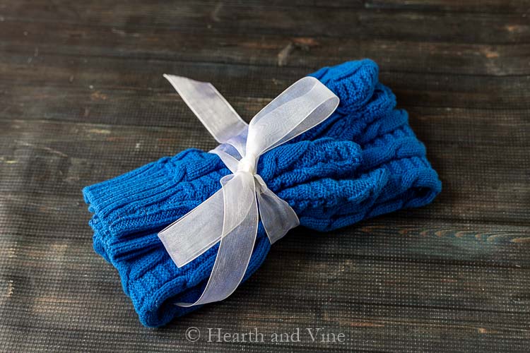 Mittens and ear warmer headband tied with ribbon
