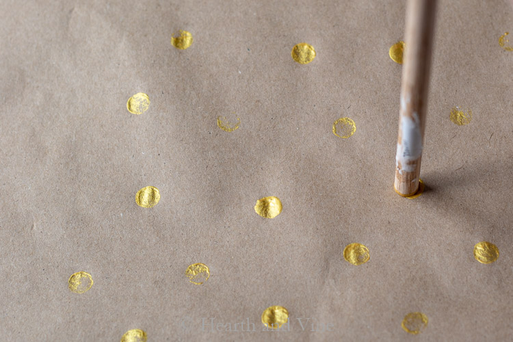 Dots of gold with dowel rod