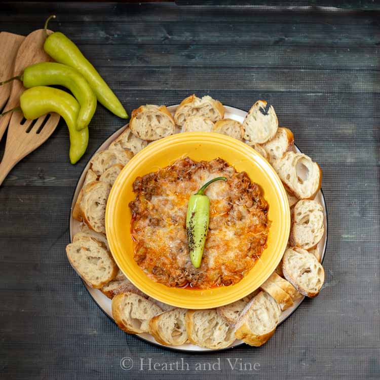 Stuffed banana pepper dip with baguette slices