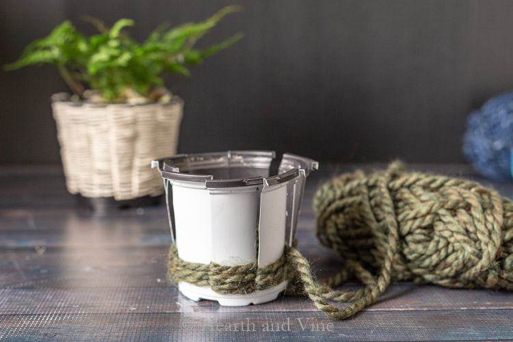 Woven planter with green yarn