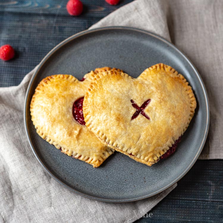 2 heart shaped raspberry pies