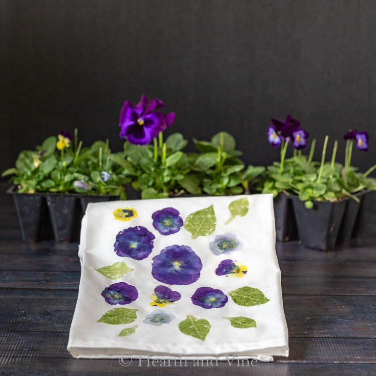 Decorative tea towel made with flower pounding