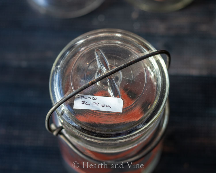 Wire bail mason jar with price sticker