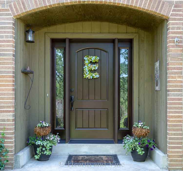 Two tiered planters on front porch