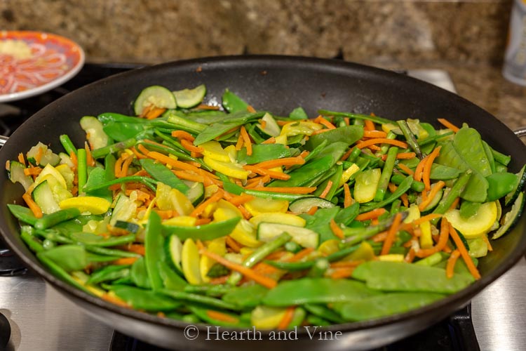 Stir fry vegetable in a large pan