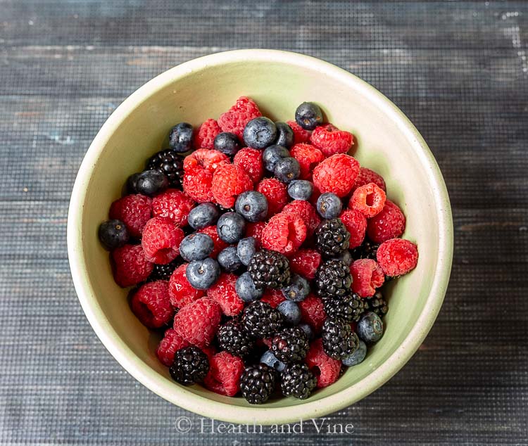Raspberries, blackberries and blueberries in bowl