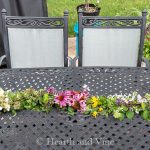 Fresh flower garland on table