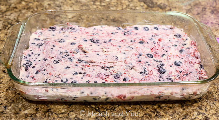 Three berry buckle batter in baking pan