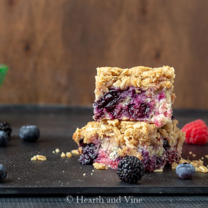 Servings of triple berry buckle stacked