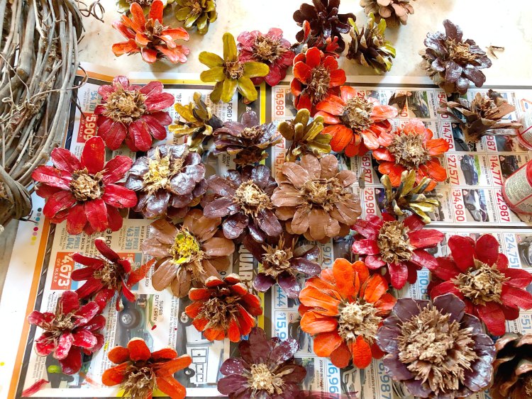 Painted pine cone flowers