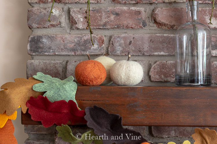 Fall mantel with felted pumpkins