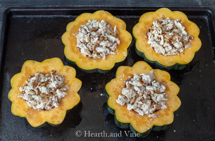 Acorn squash stuffed with turkey and pine nuts