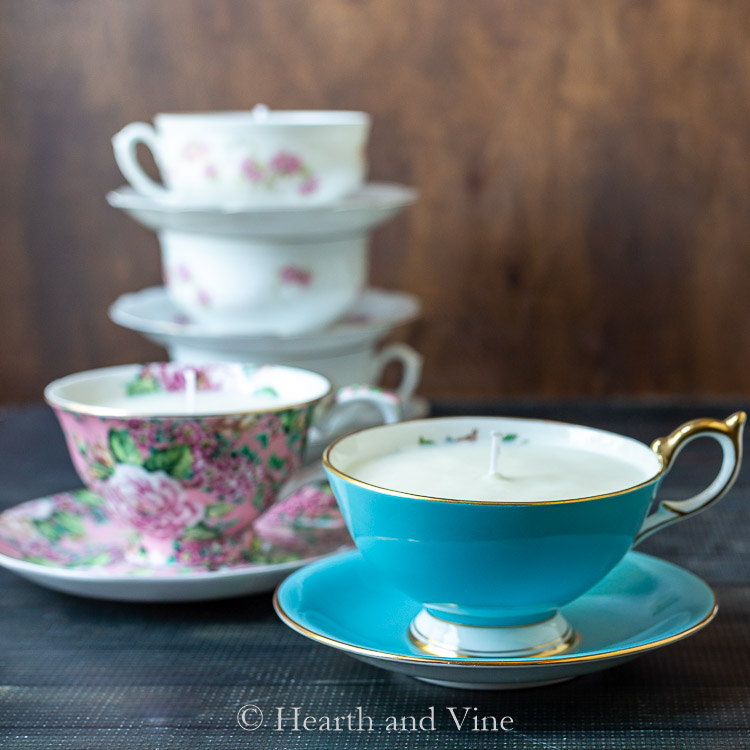 Blue teacup candle and pink in background