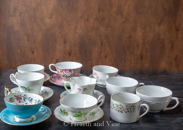 Vintage teacup and thrift store mugs