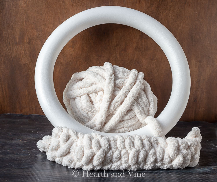 Finger knit yarn and foam wreath base