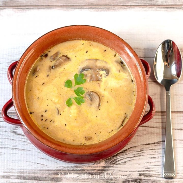 Mushroom soup with gnocchi in a red crock
