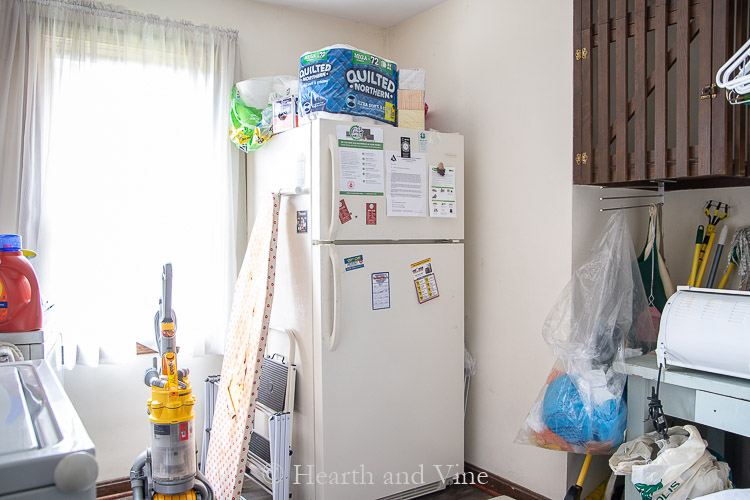 Before picture of laundry room from kitchen