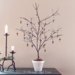 Branch Christmas tree with metallic acorn ornaments