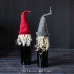 Two gnome wine bottle toppers