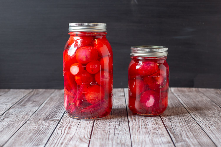 Jars of pickled radishes and red onion