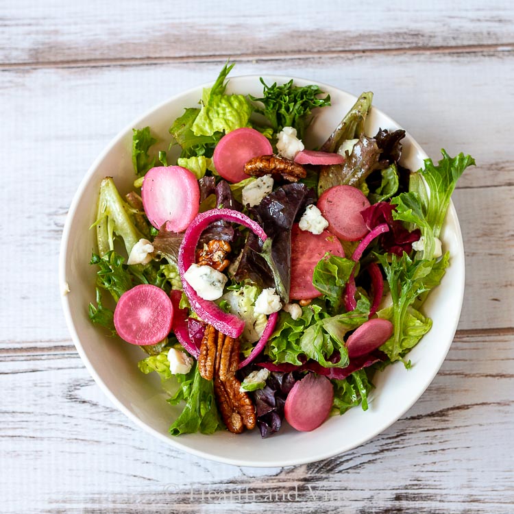 Winter salad serving in white bowl