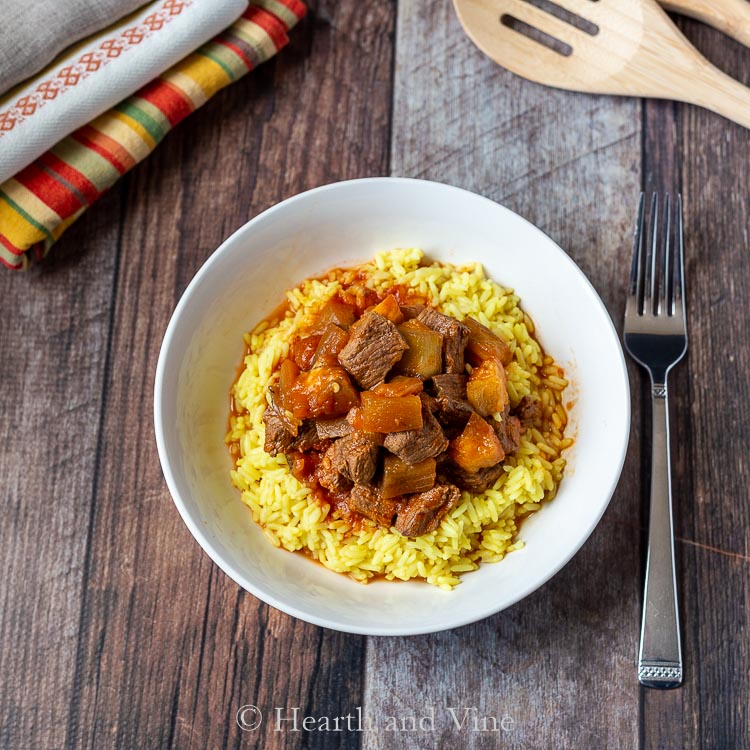 Eggplant beef stew on turmeric rice