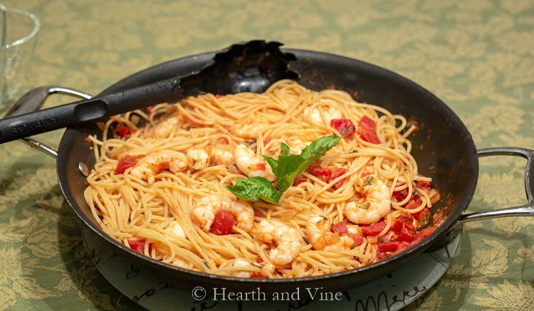 Skillet with shrimp and tomato pasta